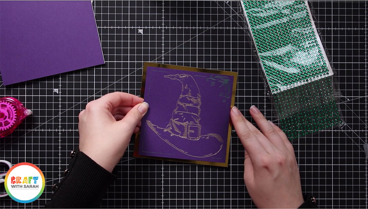 Attach the foiled design to the gold mirror card