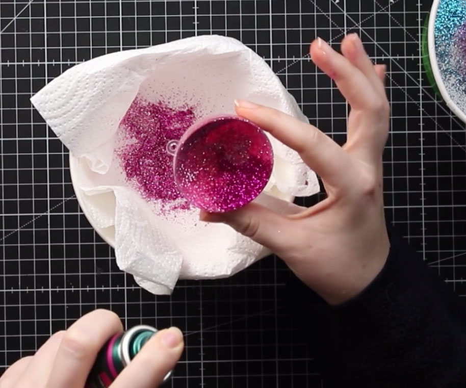 Seal the glitter with another coat of hairspray