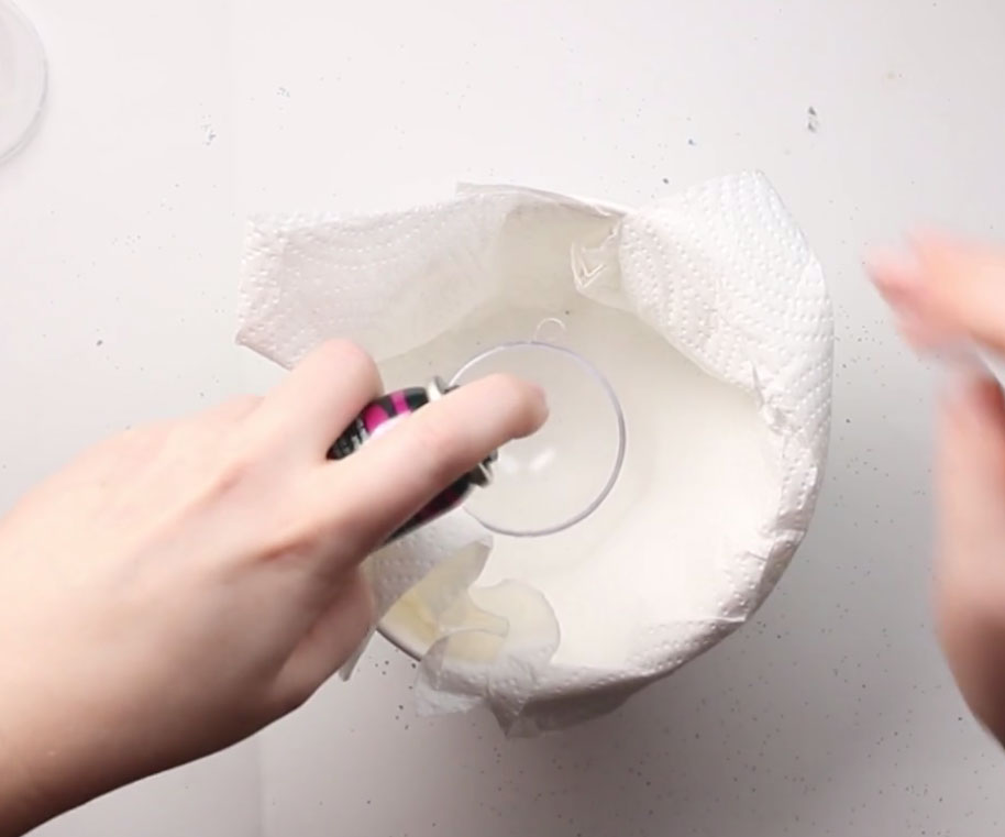 Spray hairspray into the ornament