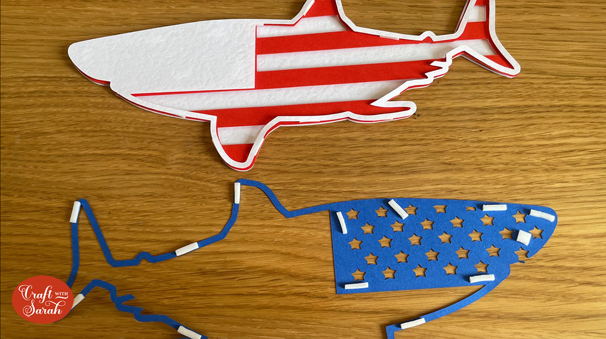 Use foam pads to stick the blue layer onto the white layer